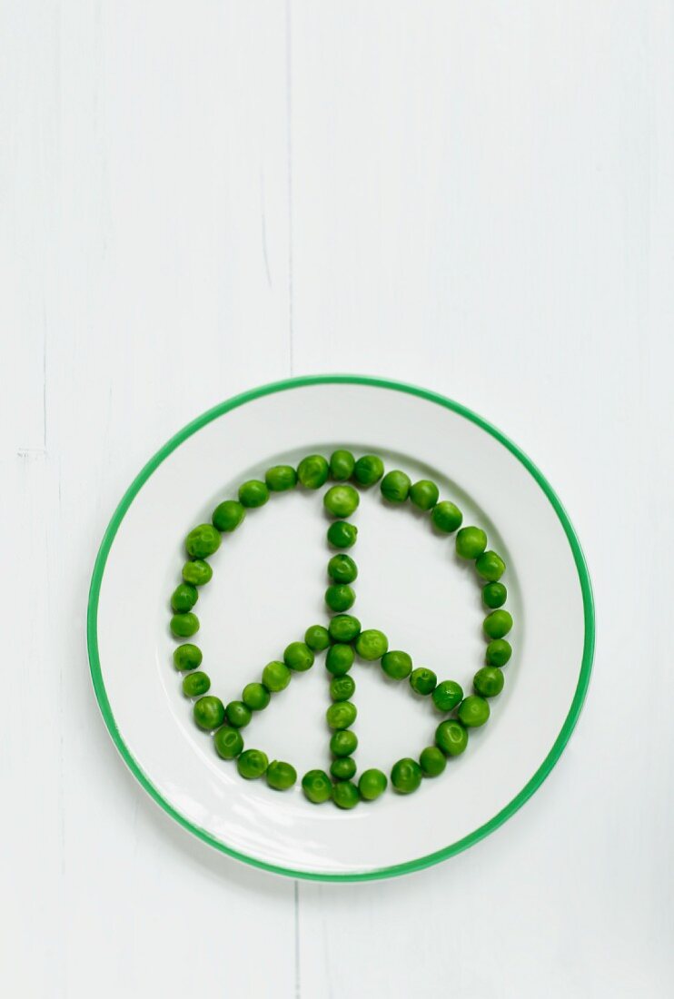 A peace sign made out of peas