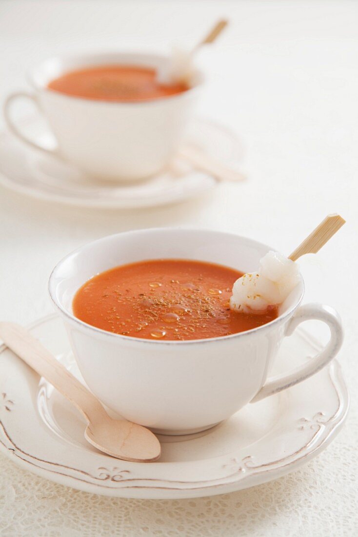 Ajo colorao (potato and tomato soup, Spain) with a fish skewer