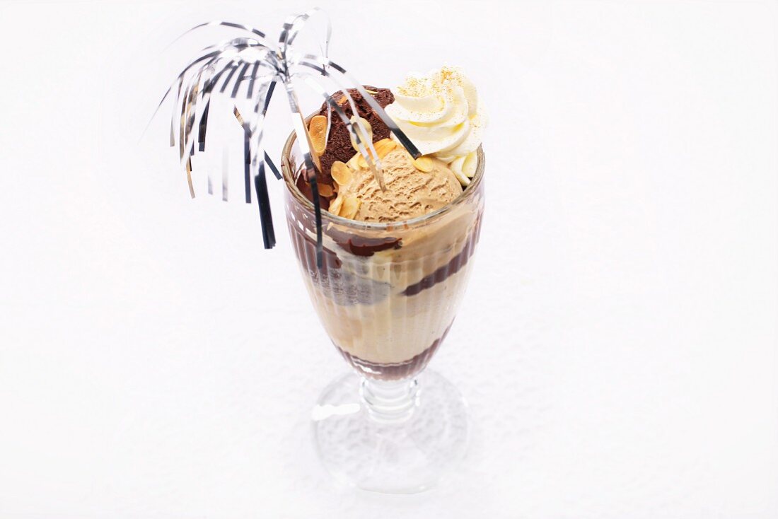 An ice cream sundae with chocolate and cream