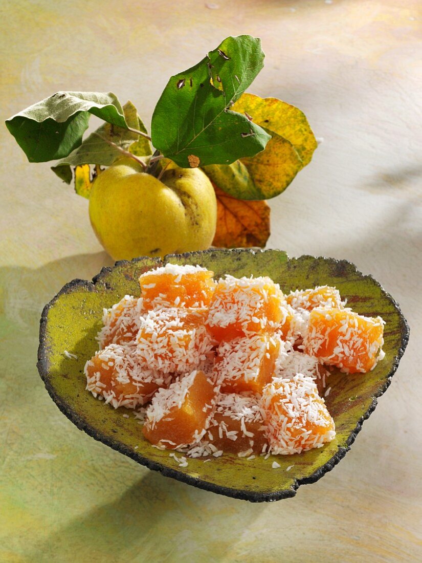 Quince and ginger sweets with grated coconut