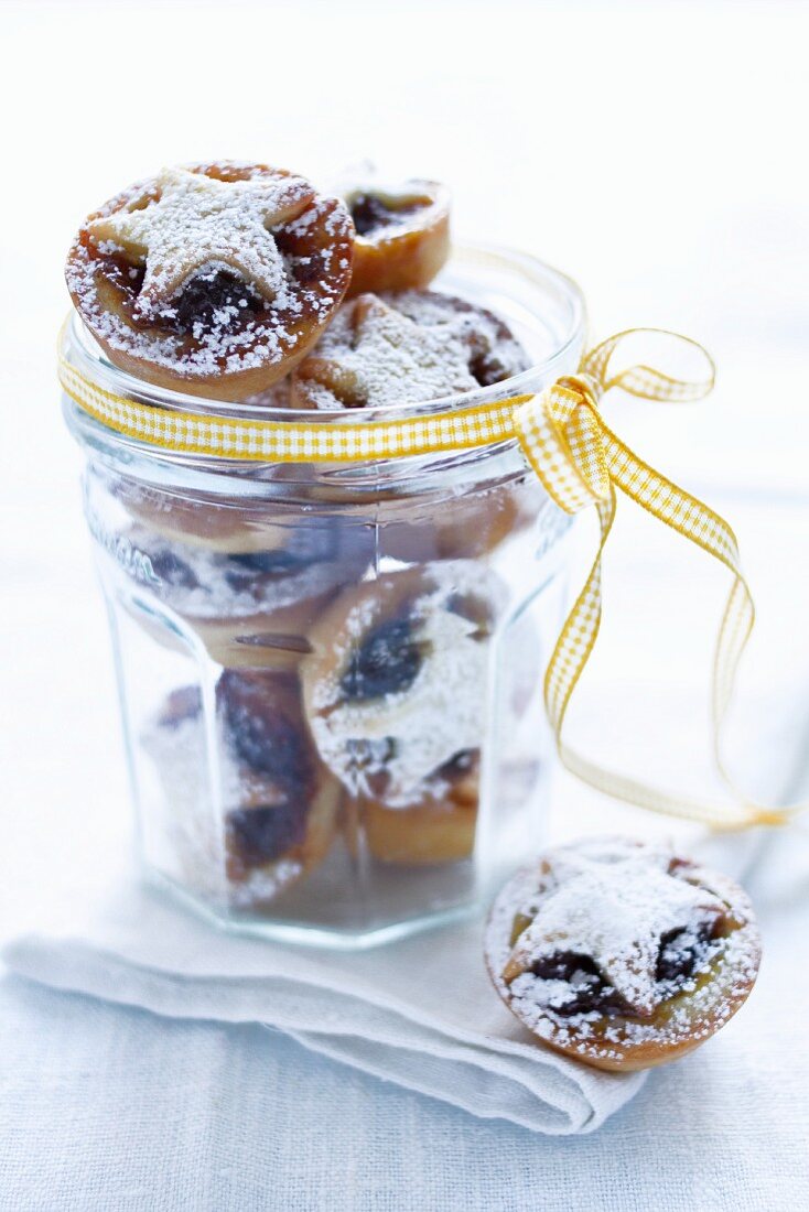 Mince pies in a jar tied with a ribbon