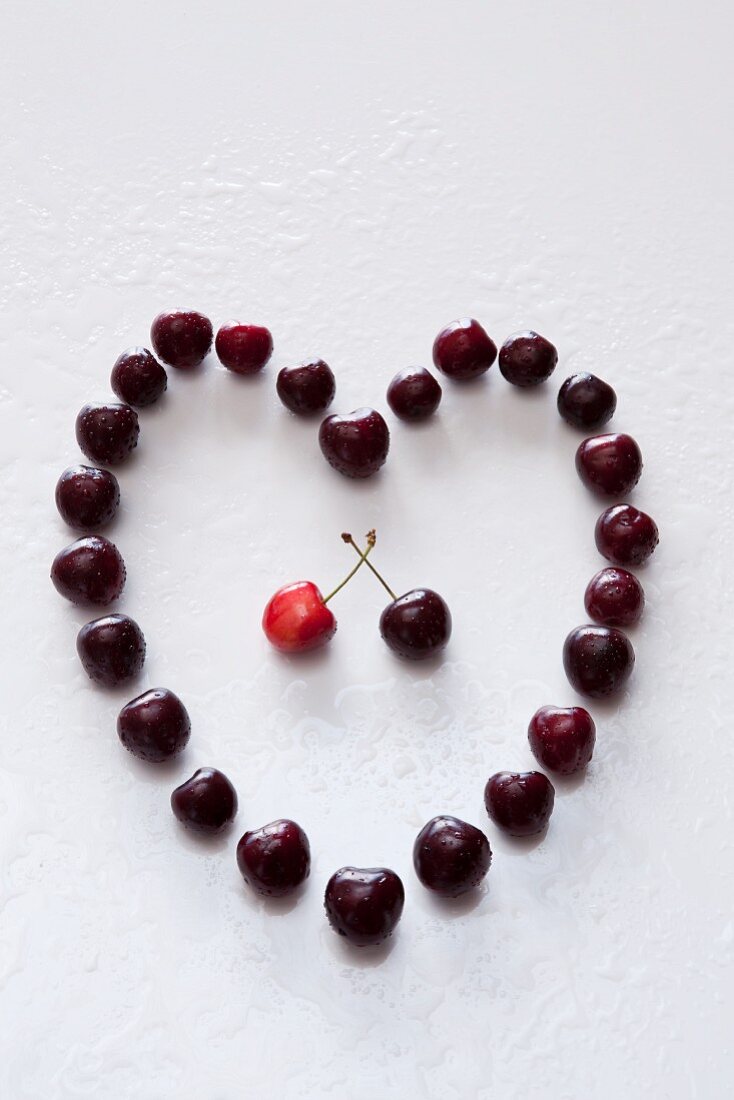 A heart made of sweet cherries