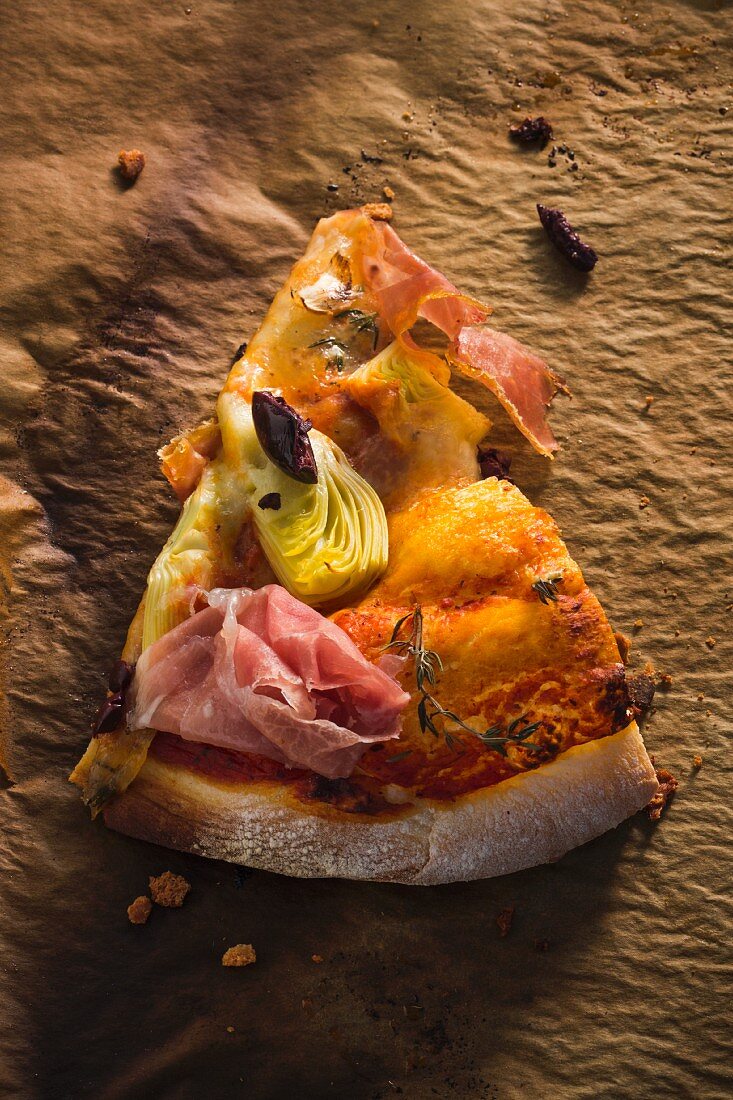 A Slice of Prosciutto, Artichoke and Olive Pizza