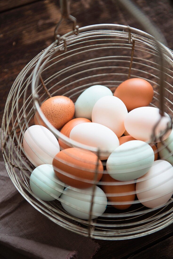 Hen's eggs in a wire basket