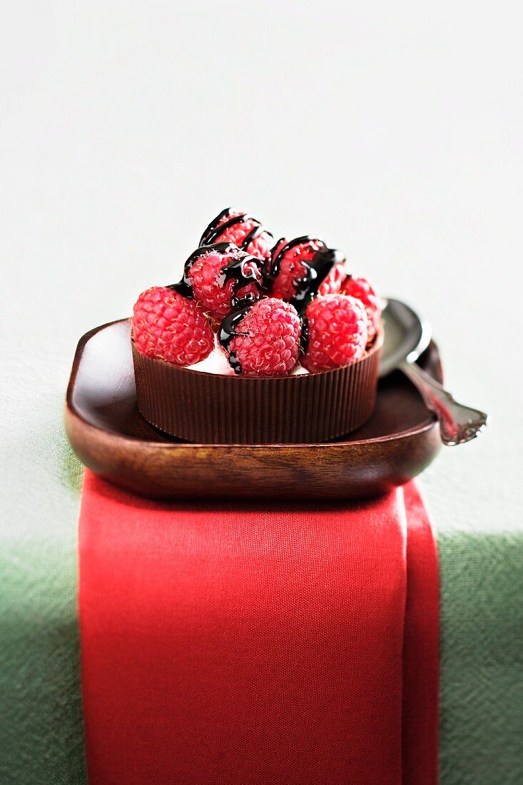 Raspberries with Chocolate Drizzle on Mascarpone Cheese in a Chocolate Cup; Spoon
