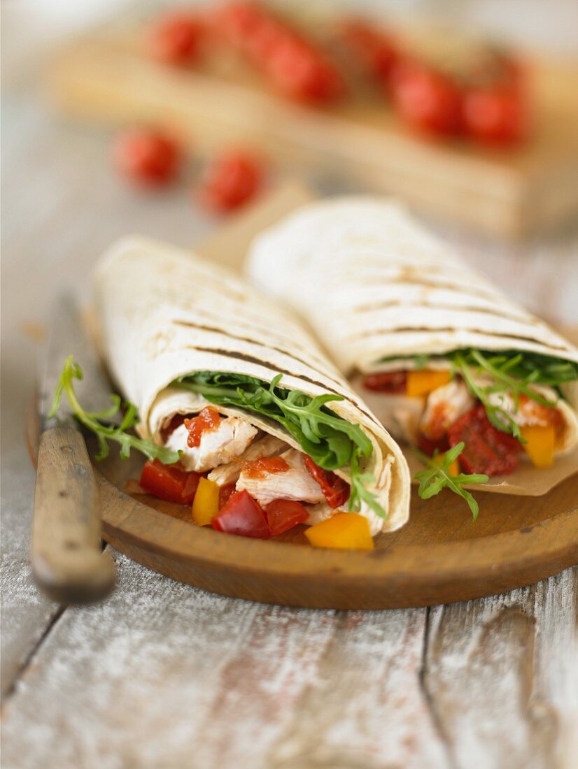 Wraps filled with chicken and peppers