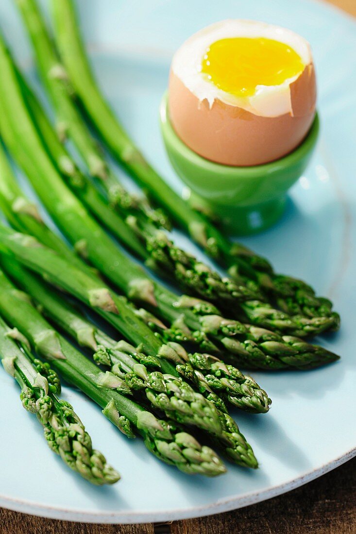 Cooked asparagus and soft boiled egg