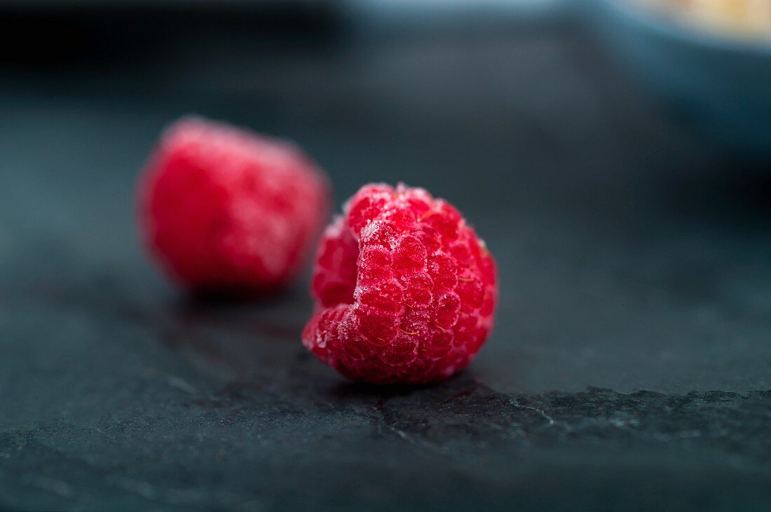 Two frozen raspberries