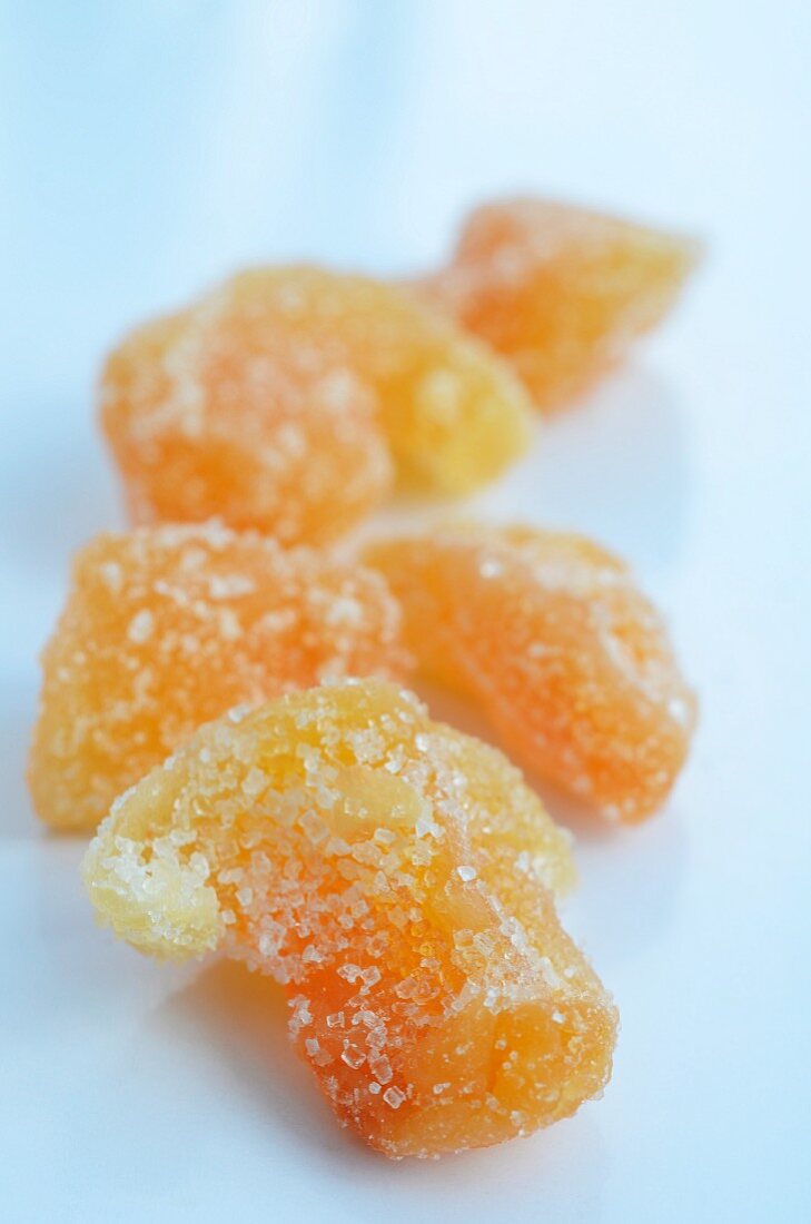 Pile of Candied Ginger on White Background