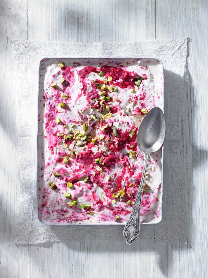Home-made raspberry and pistachio ice cream