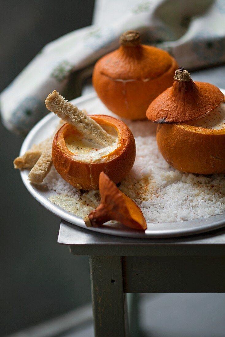 Cream of pumpkin soup in hollowed-out Hokkaido pumpkins