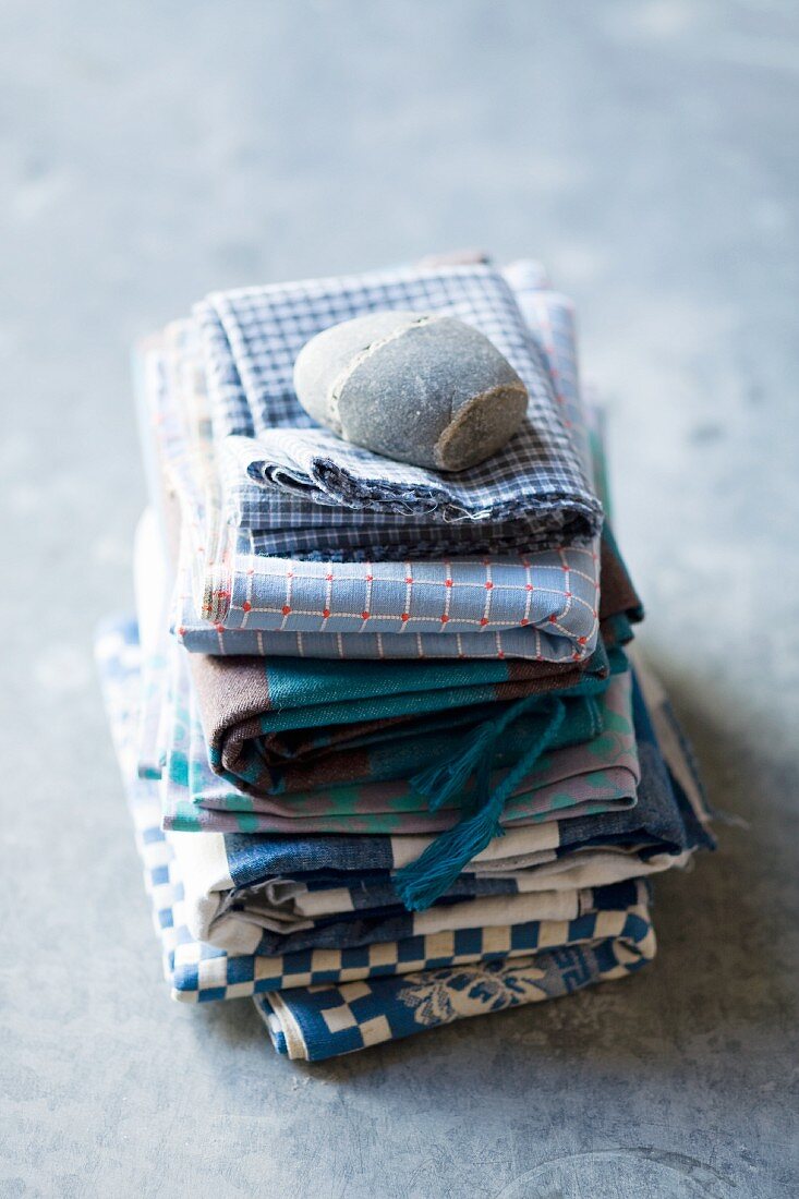 Assorted tea towels, stacked