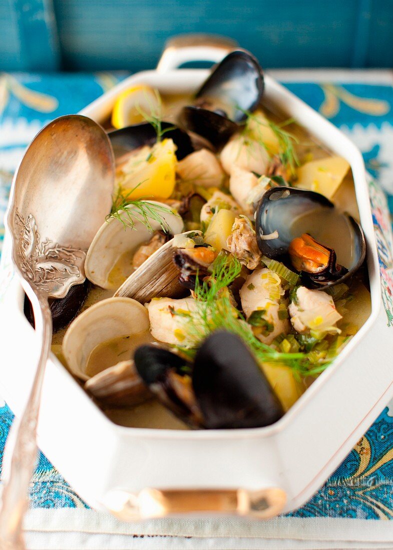 Mussel and Clam Stew with a Silver Serving Spoon