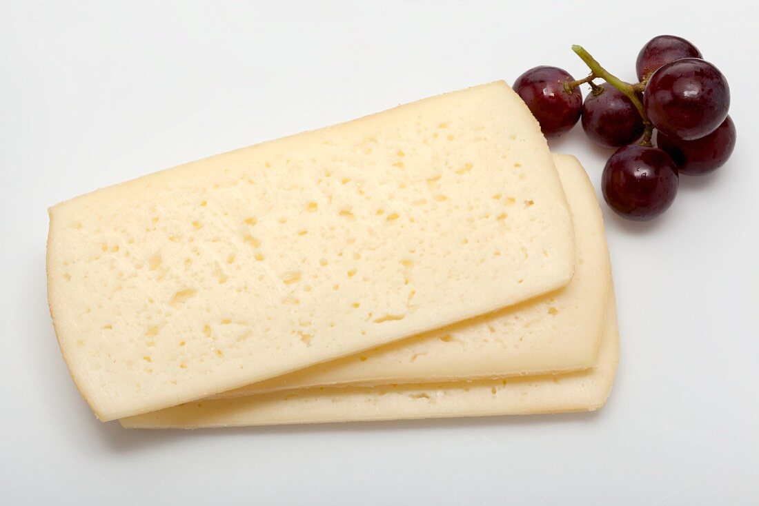 Esrom (semi-hard cheese from Denmark) and red grapes