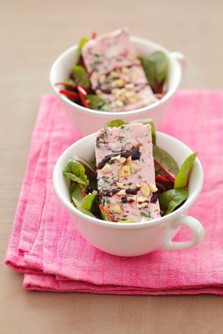 Cream cheese terrine with beetroot leaves and balsamic reduction