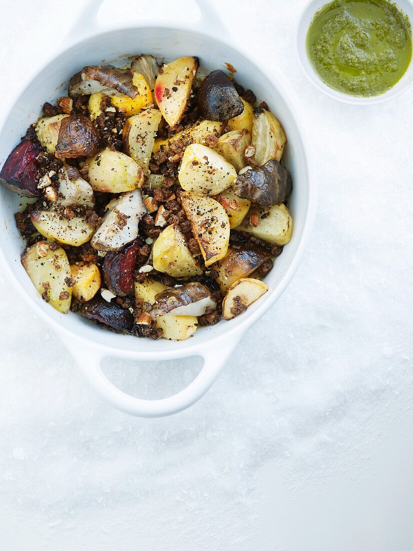 Pot-roasted root vegetables with almonds and breadcrumbs