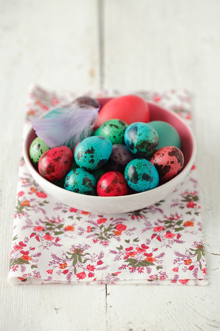 A small dish with coloured quail's eggs