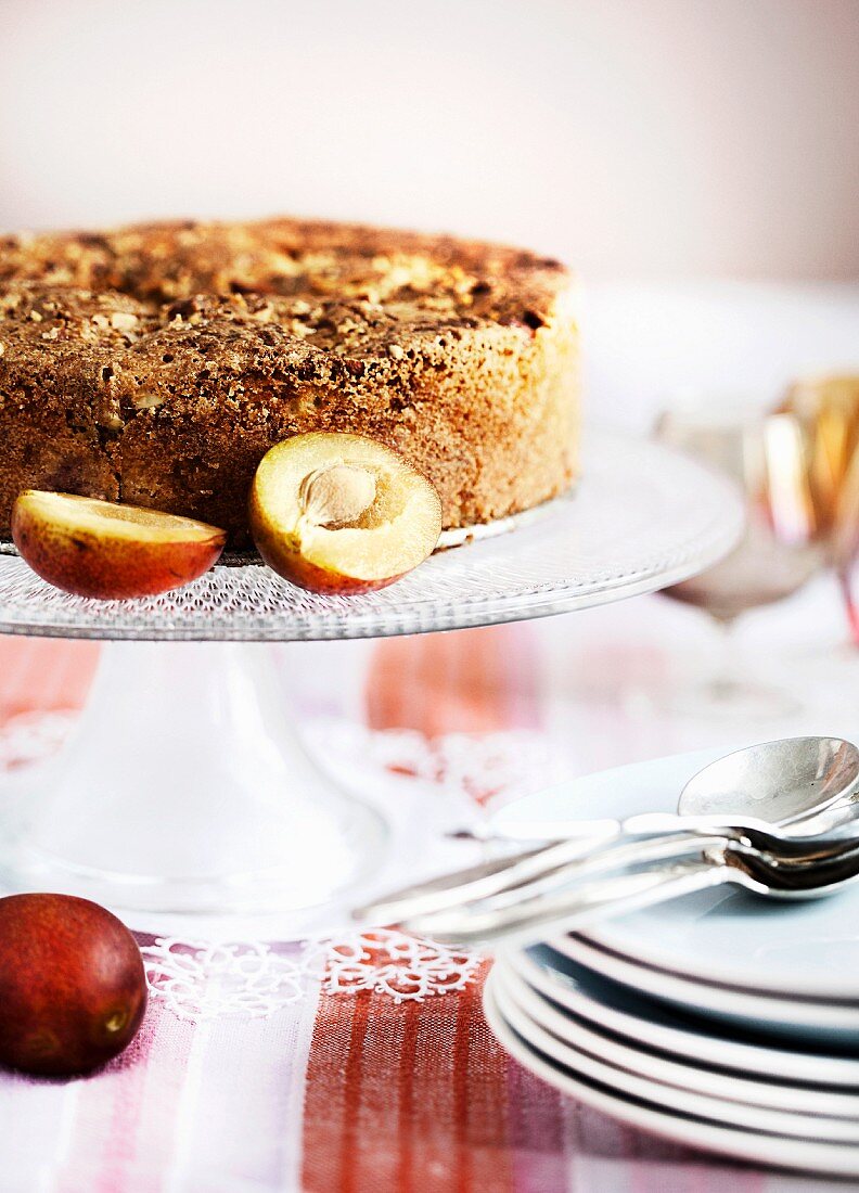 Plum cake on a cake stand