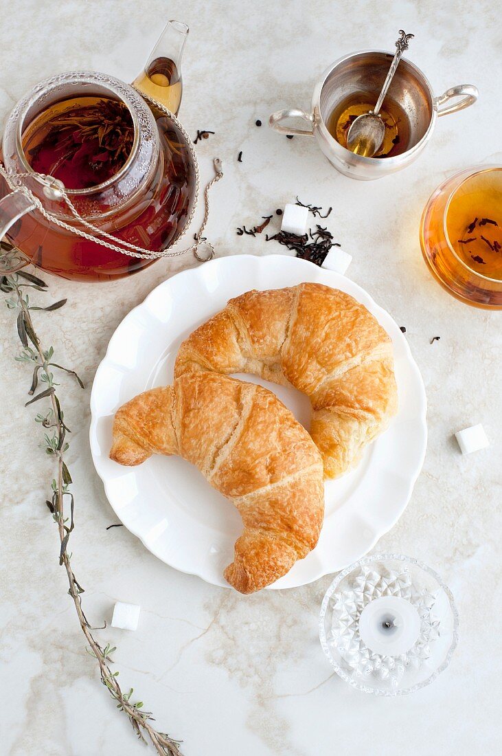 Croissants, honey and tea