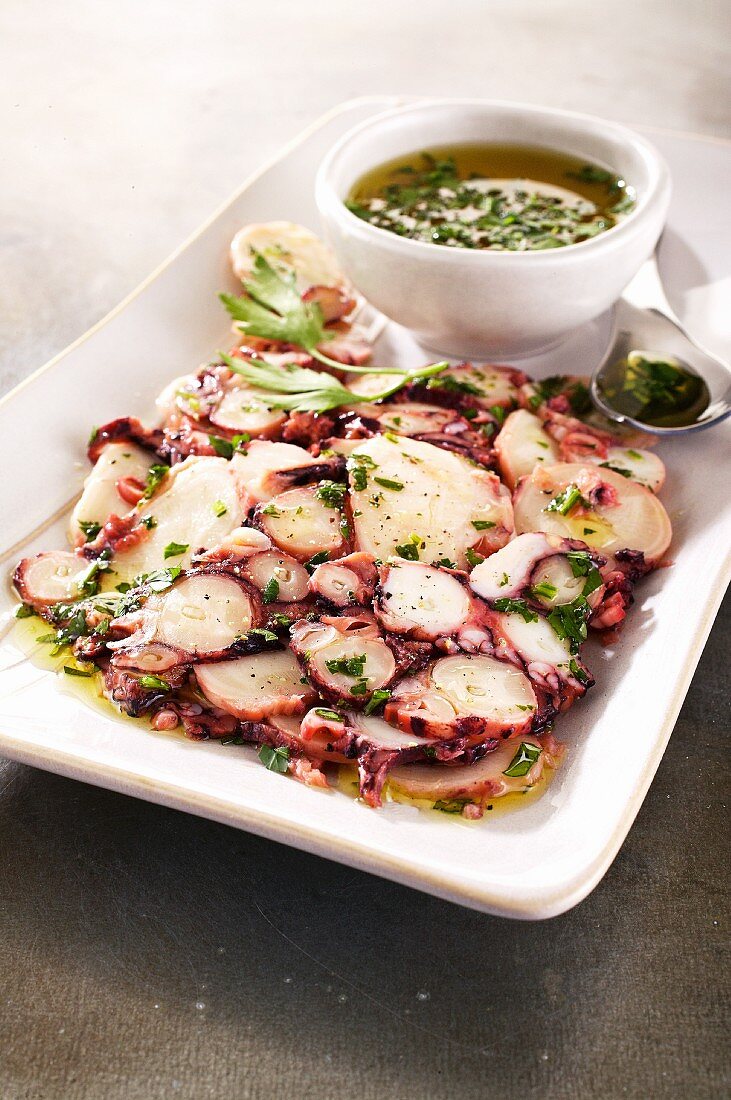 Carpaccio of octopus with herb oil