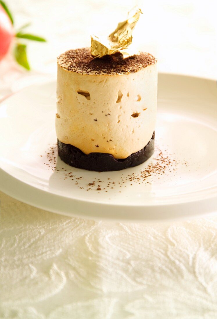 Quark mousse with chocolate and gold leaf