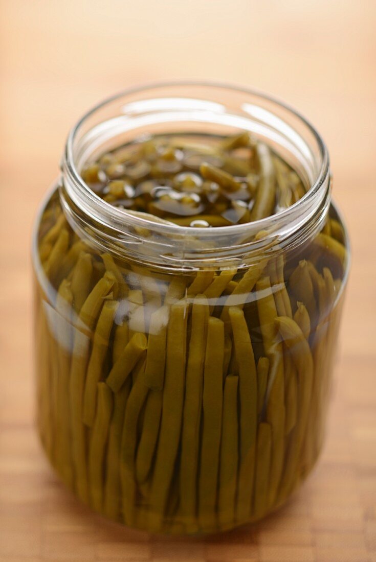 Pickled green beans in a screw-top jar