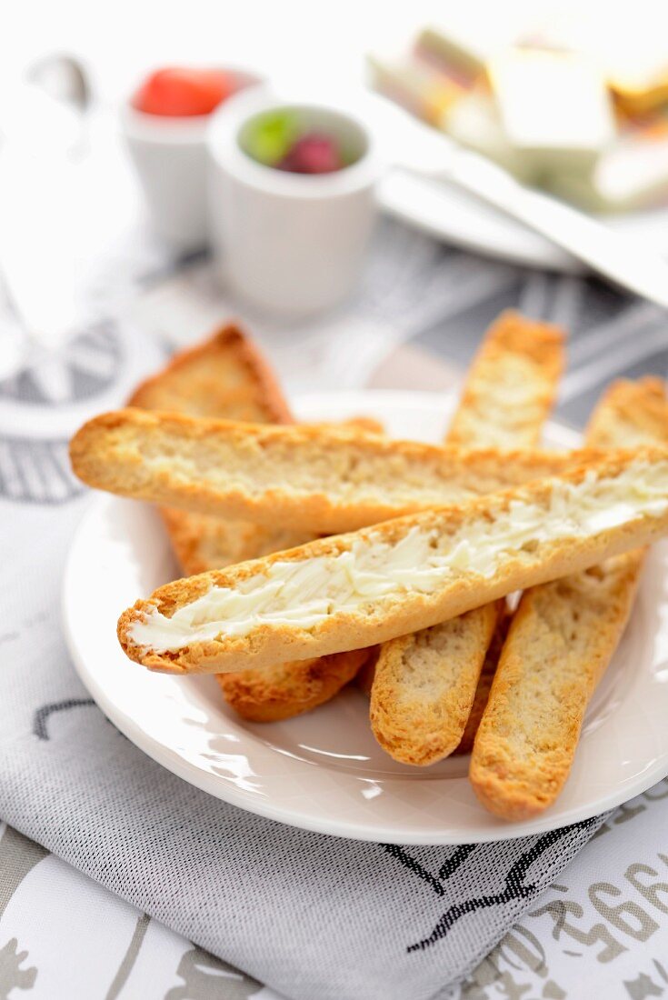 Crispy slices of bread with butter