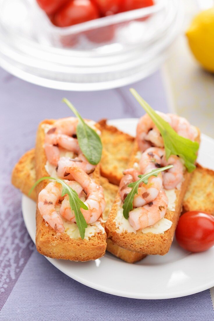 Crispy toasted rolls topped with marinated prawns