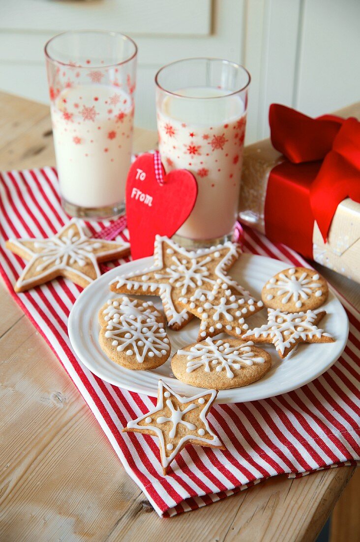 Christmas biscuits, milk and a Christmas present