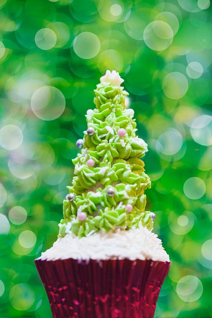 A Christmas tree cupcake