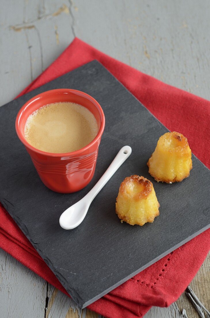 Canelés with coffee (mini French pastries)