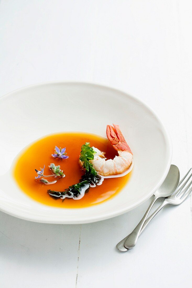 Rooibos steamed crayfish with iced rooibos-and-tomato consomme