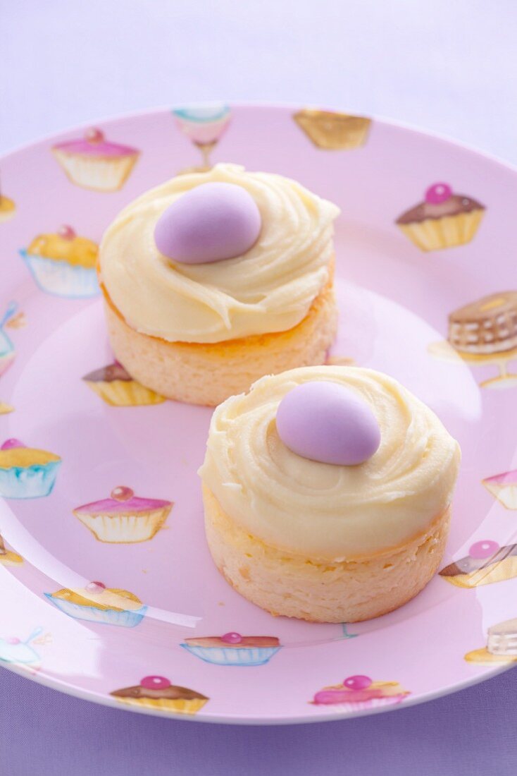 Mini cheesecakes with vanilla custard and marzipan eggs