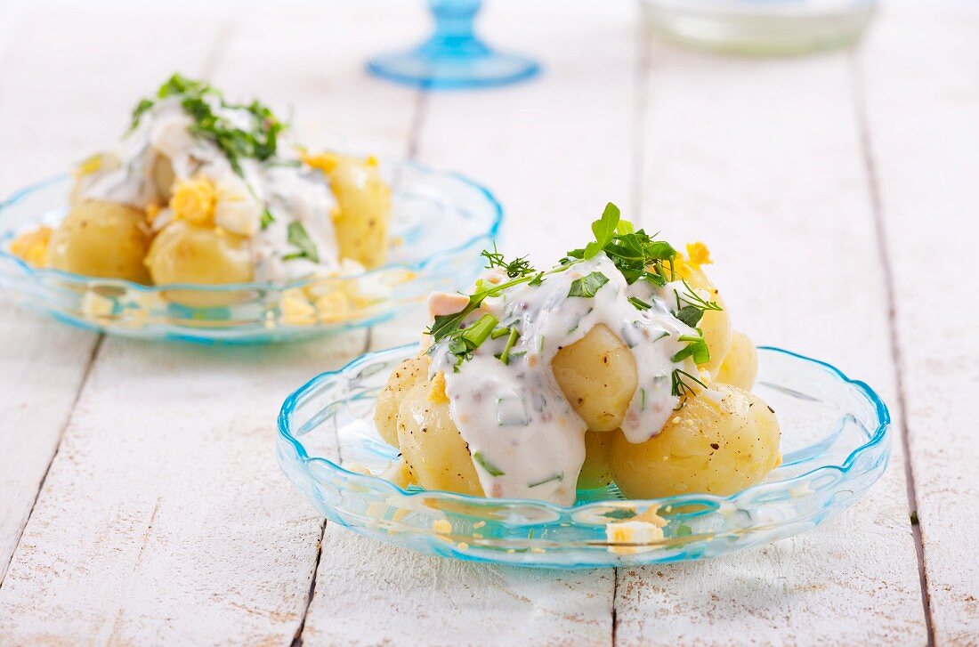 Potato salad with hard-boiled eggs, sour cream, fennel and chives