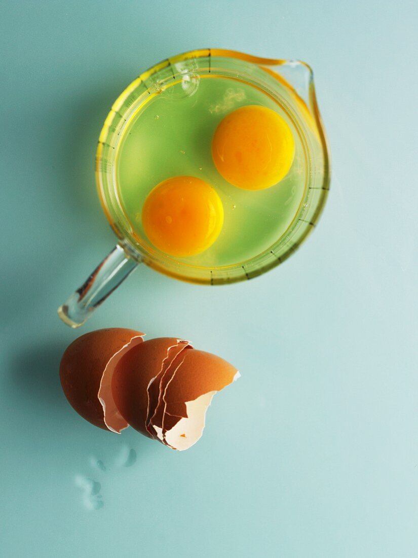 Two raw eggs in a measuring jug