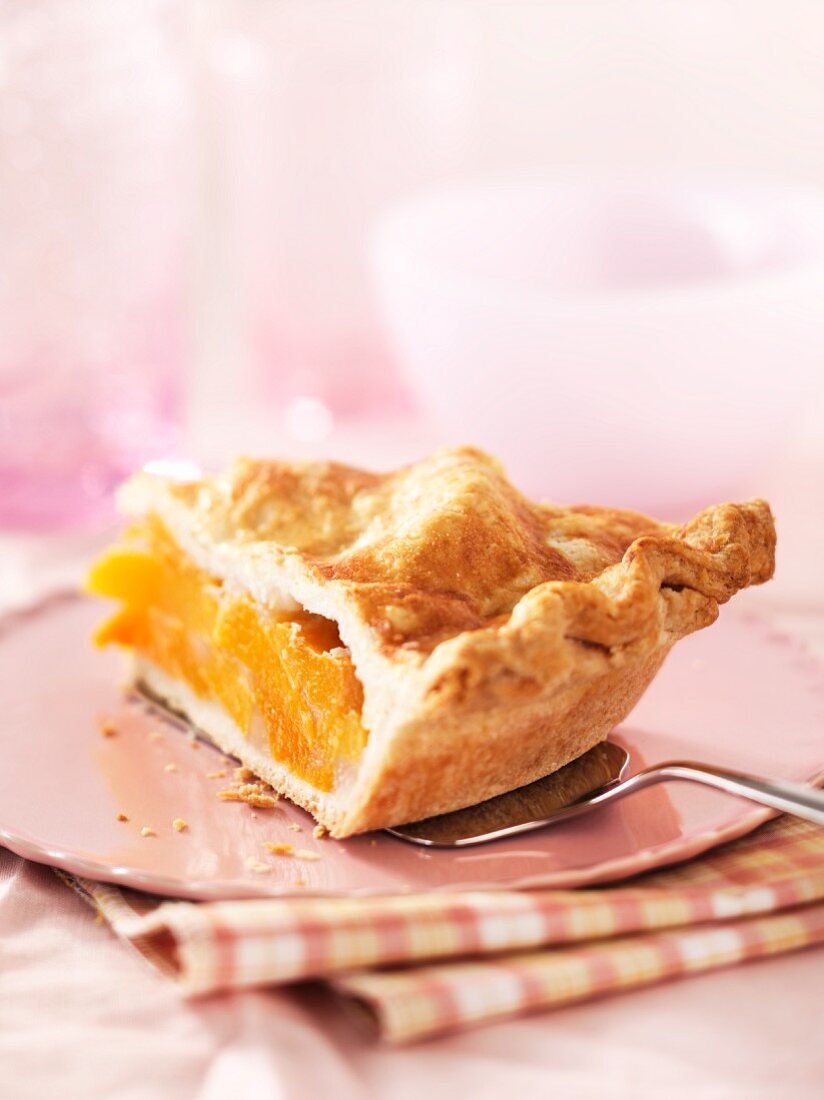 A slice of peach pie