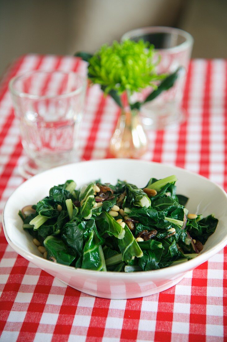 Cooked chard with pine nuts and raisins