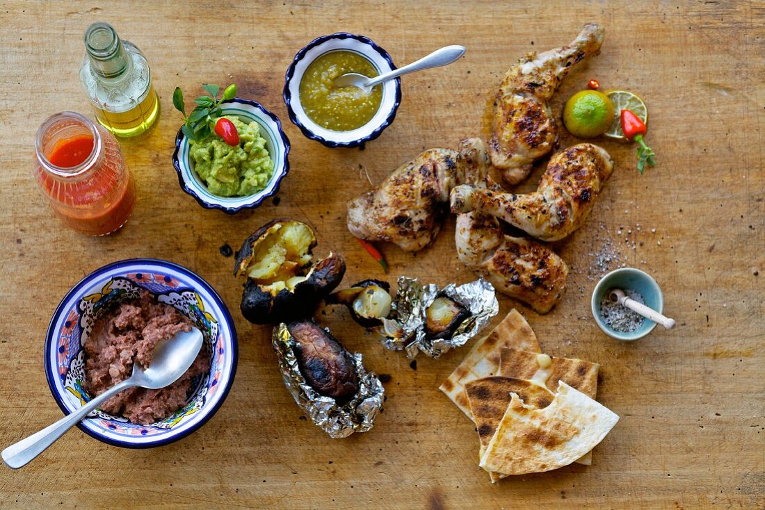 Barbecued chicken legs with Mexican dips