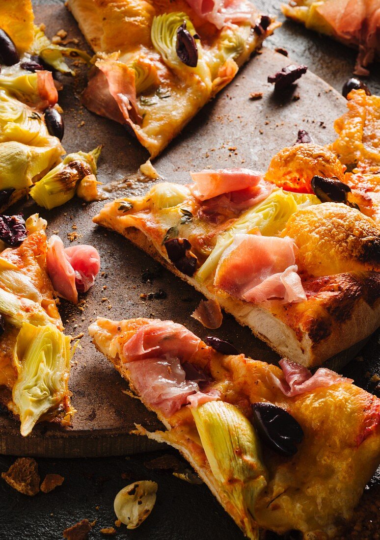 Pancetta, Artichoke and Olive Pizza Slices on Stone