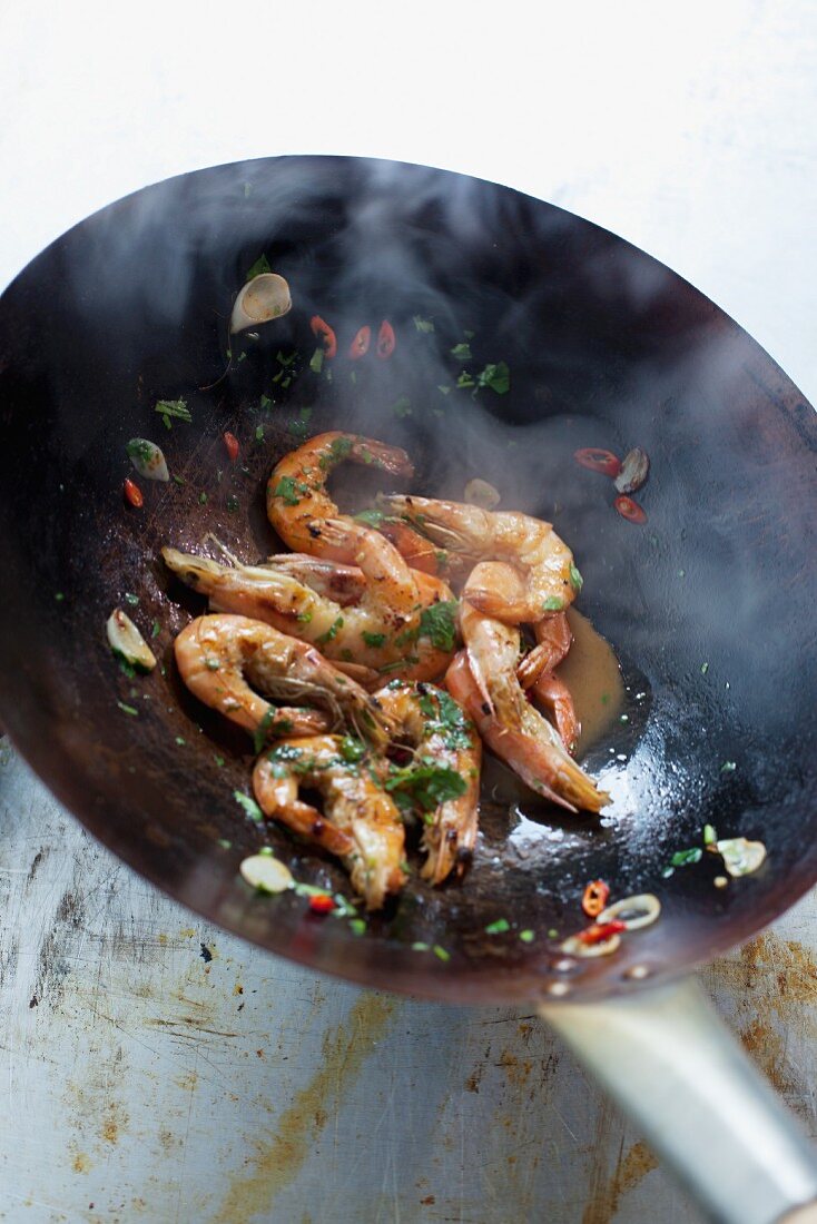 Fried prawns in a wok