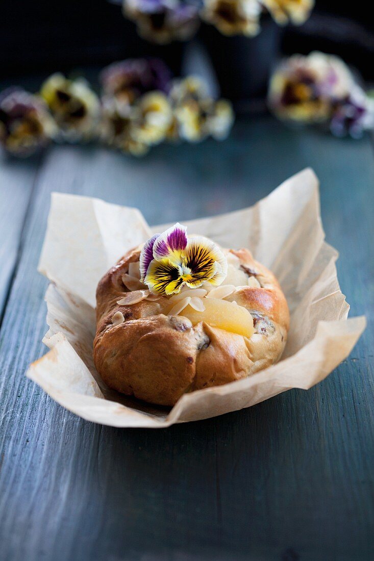 Plaited pear loaf with pansies