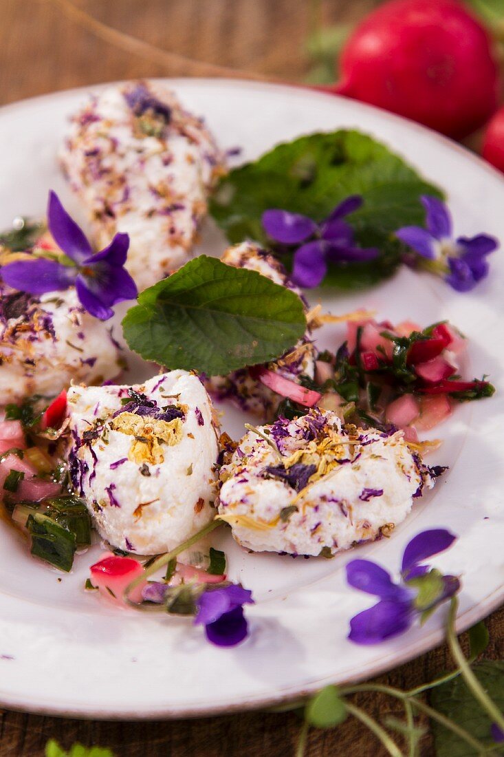 Soft goat's cheese with violet-flavoured vinaigrette