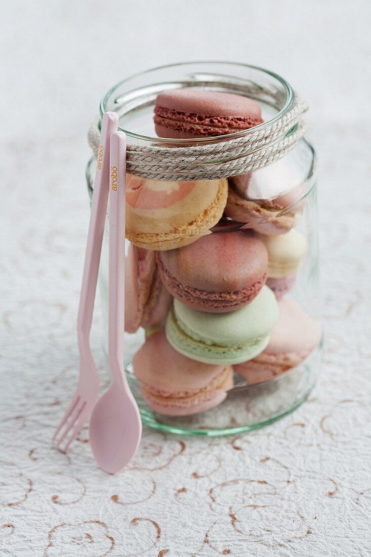 Assorted macaroons in a jar