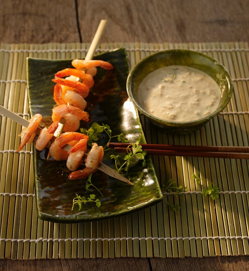 Curry and coconut sauce; served with prawn skewers
