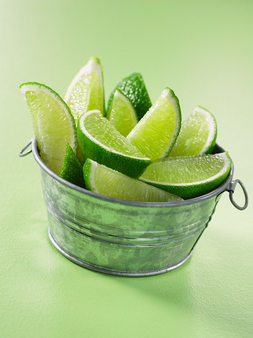 Lime wedges in a metal container