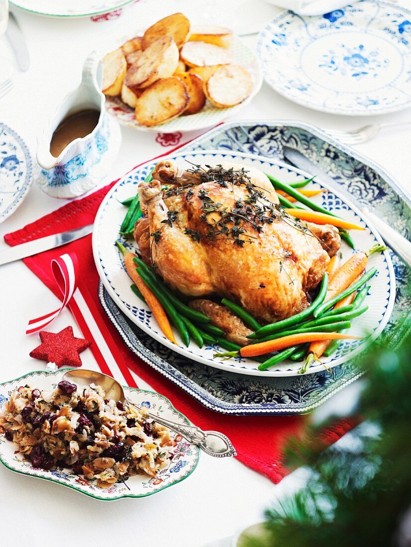 Roast chicken stuffed with thyme and cranberries