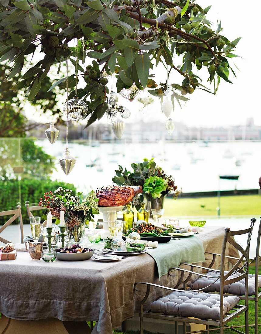 A festive table laid outside for Christmas dinner