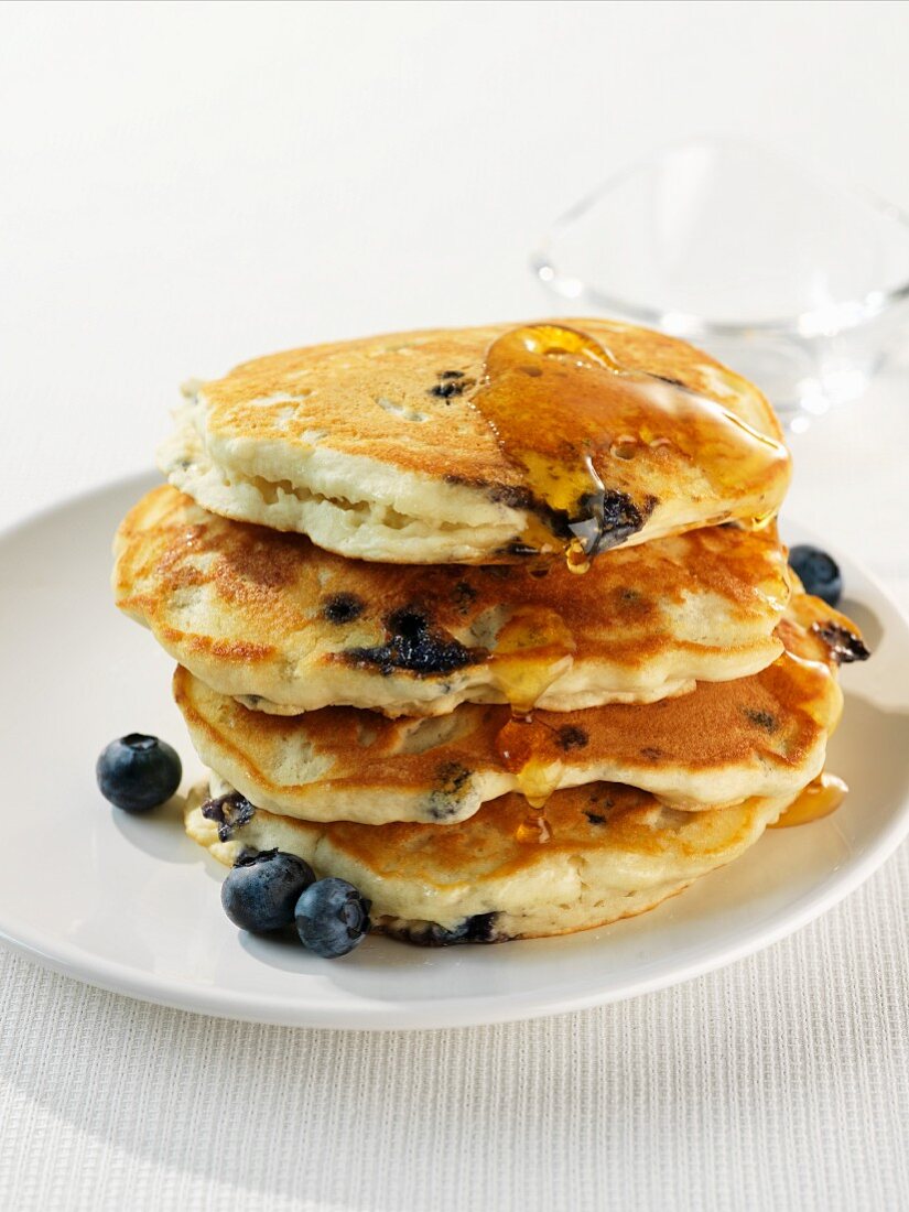 Stack of Blueberry Pancakes with Syrup