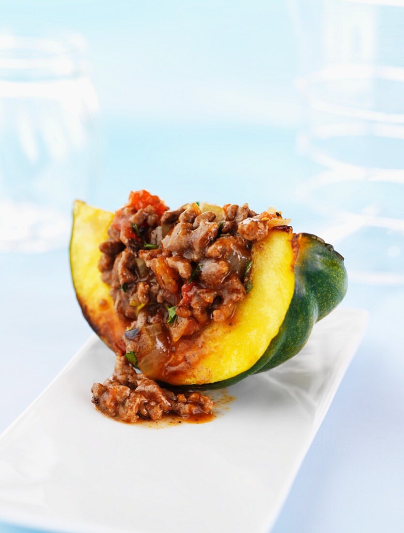 A wedge of squash filled with minced meat