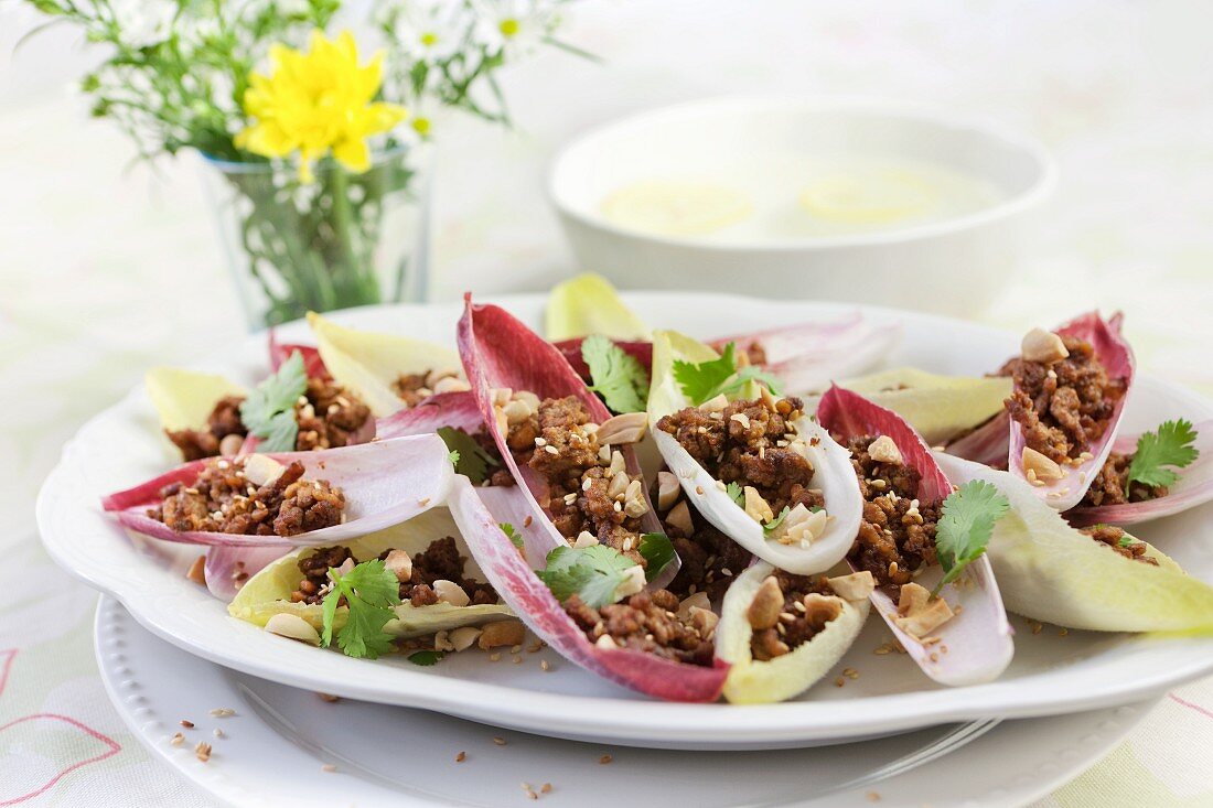 Thai dish of seasoned pork in salad leaves